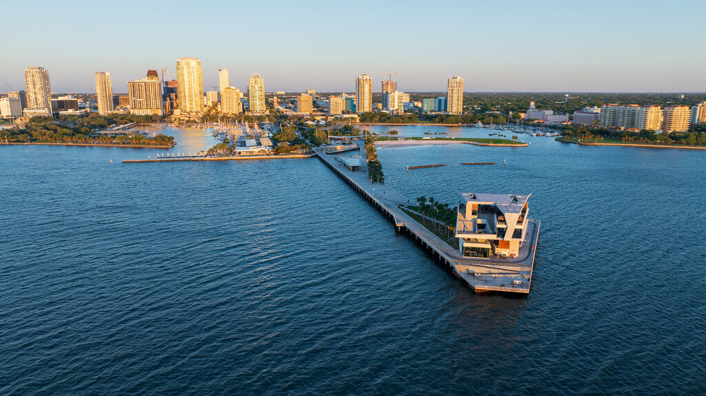 Aerial view of St. Petersburg, Florida, with the St. Pete Pier and downtown skyline, illustrating Florida’s year-round sunshine and UV exposure.